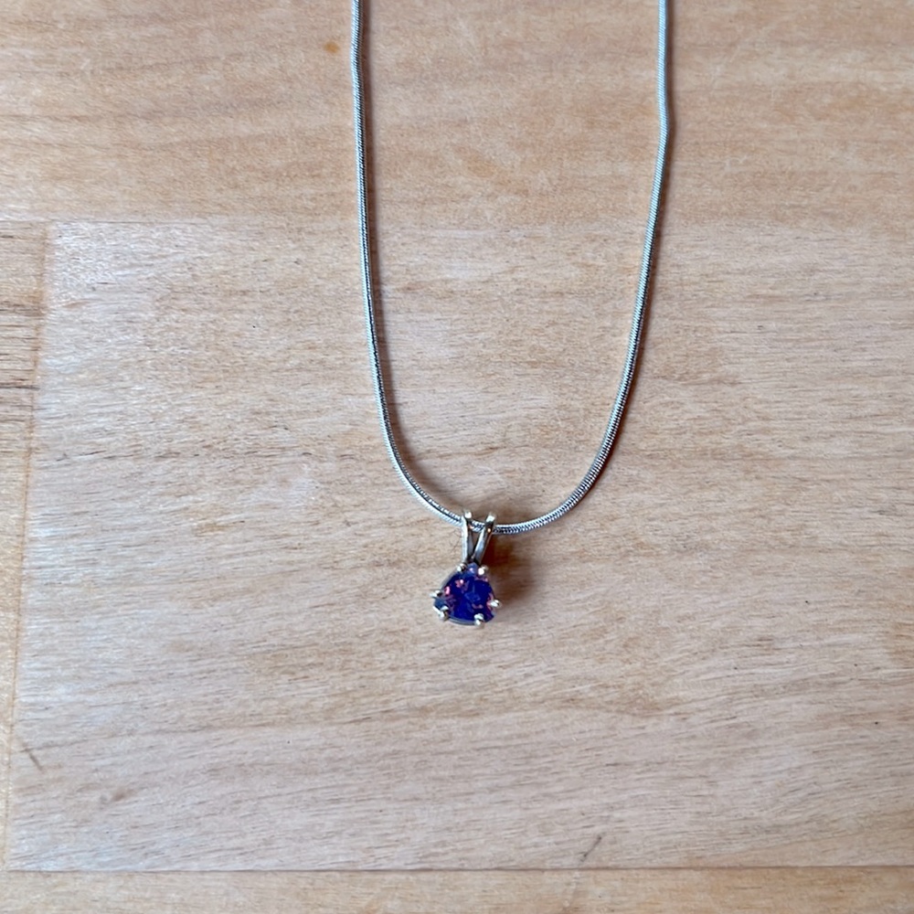 Tanzanite and white gold pendant with 24k white gold chain.